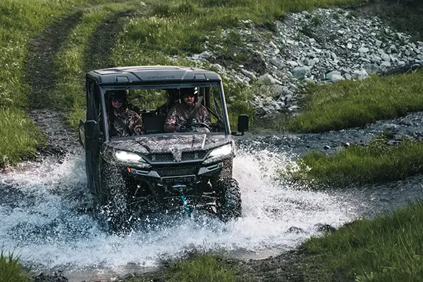 The 2026 CFMOTO UFORCE 1000 XL in a work environment